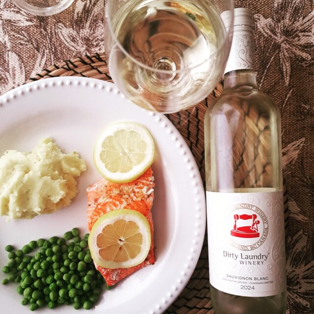 @dirtylaundrywinery Sauvignon Blanc with sockeye Salmon🇨🇦🥂

“Fruit sourced from Yakima Valley, WA, vineyards, fermented separately with various yeasts to give us some blending options. Fruit was destemmed and crushed, soaked on skins for 2 hours under CO2 in the press before gently pressing off skins into stainless tanks. Lees stirring in stainless tanks is performed once daily to build complexity and body. Fermentation temperatures were kept low to preserve the delicate aromatics of Sauvignon Blanc.”

Alcohol % 12.9 / pH 3.37/ TA 5.3 / RS 1.9

Pale lemon in hue, this wine captivates with vivid aromas of tropical fruit, zesty citrus, and fresh spring herbs. Its medium-bodied palate is crisp and fruit-forward, offering a harmonious balance of bright acidity and vibrant flavours, including gooseberry, lemon zest, lime, mandarin orange, passion fruit, and a subtle hint of grapefruit. Refreshing and elegant, it finishes with finesse. 92 Points.

#topshelf #yesbcwine #bcwine #foodielife #bcwinecountry #winecountry #wine #explorebc #explorebcwine #foodfriendly #winelover #wineblogger #shiptosip #BuyBC #bcwinelife #bcwinetrends #washington #bcwinetrends #craftedinbc #summerland #riedel #salmon #sauvignonblanc